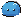 Pixel art blue slime with the left side and top right of its outline missing
